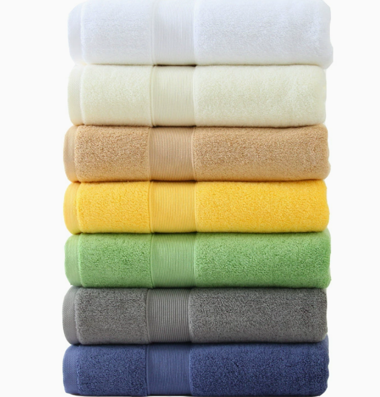 premium 100% cotton hand towels featuring a ribbed dobby border in white, cream, tan, yellow, green, grey, and navy blue