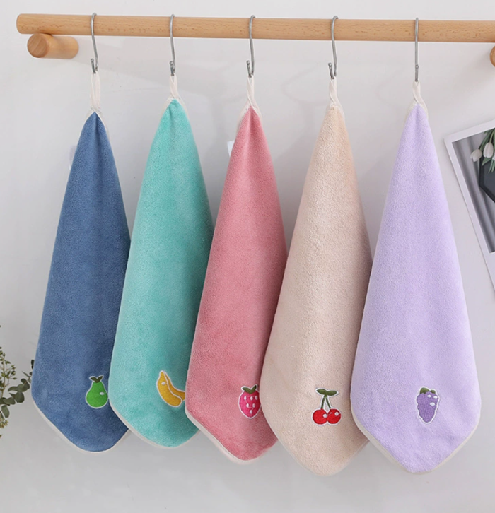 plush microfiber hand towels with hanging loops and cute embroidered fruit patches including avocado, banana, strawberry, cherries, and grapes in blue, mint, pink, beige, and purple